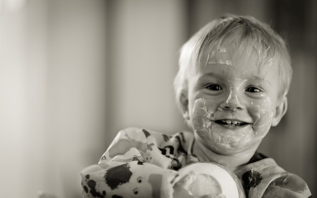 child, yogurt, eating